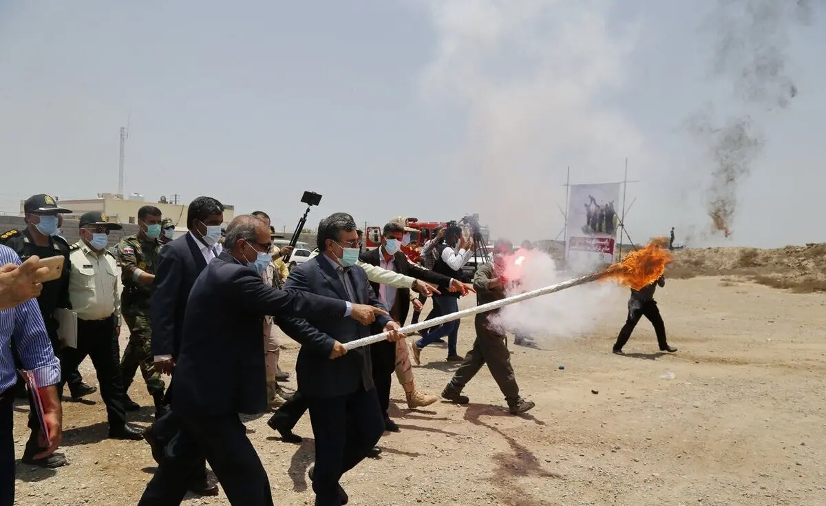 (تصاویر) آتش زدن ۱۶ تن مواد مخدر در بندرعباس