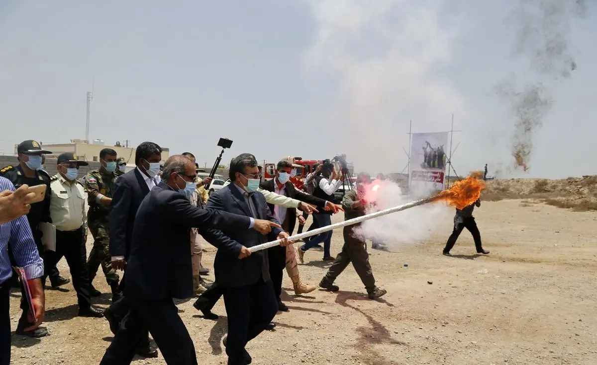 (تصاویر) آتش زدن ۱۶ تن مواد مخدر در بندرعباس