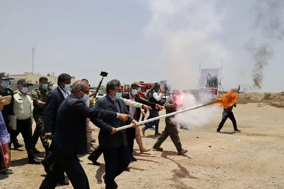 (تصاویر) آتش زدن ۱۶ تن مواد مخدر در بندرعباس