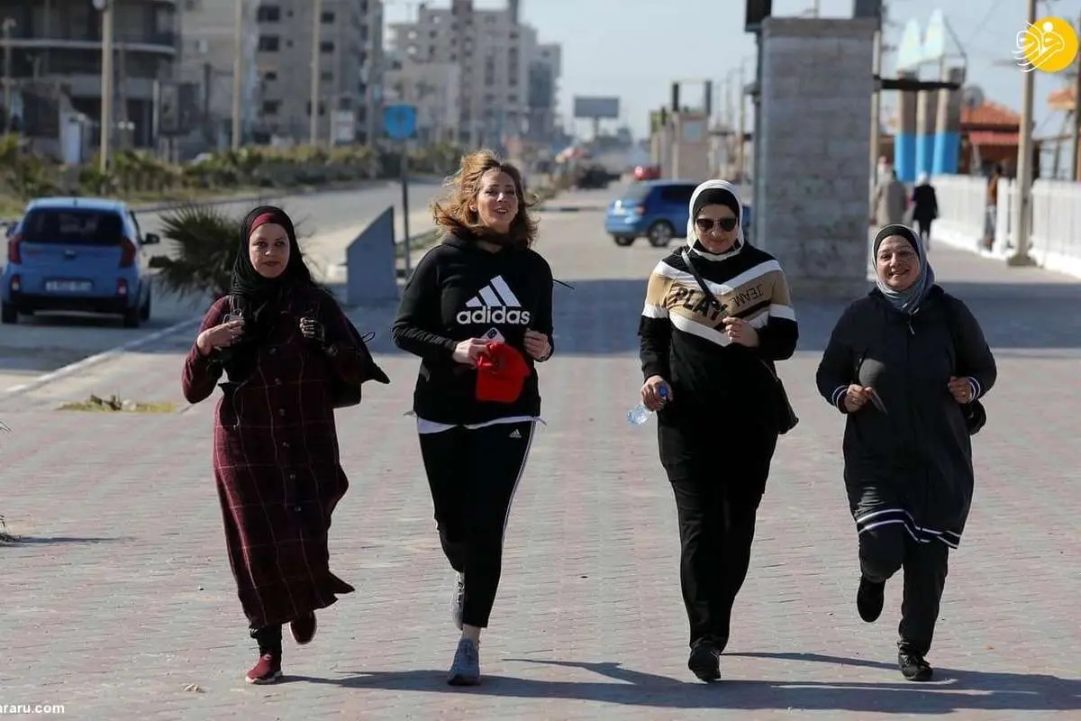 (تصاویر) پیاده روی زنان فلسطینی در تفرجگاه غزه برای ترویج ورزش