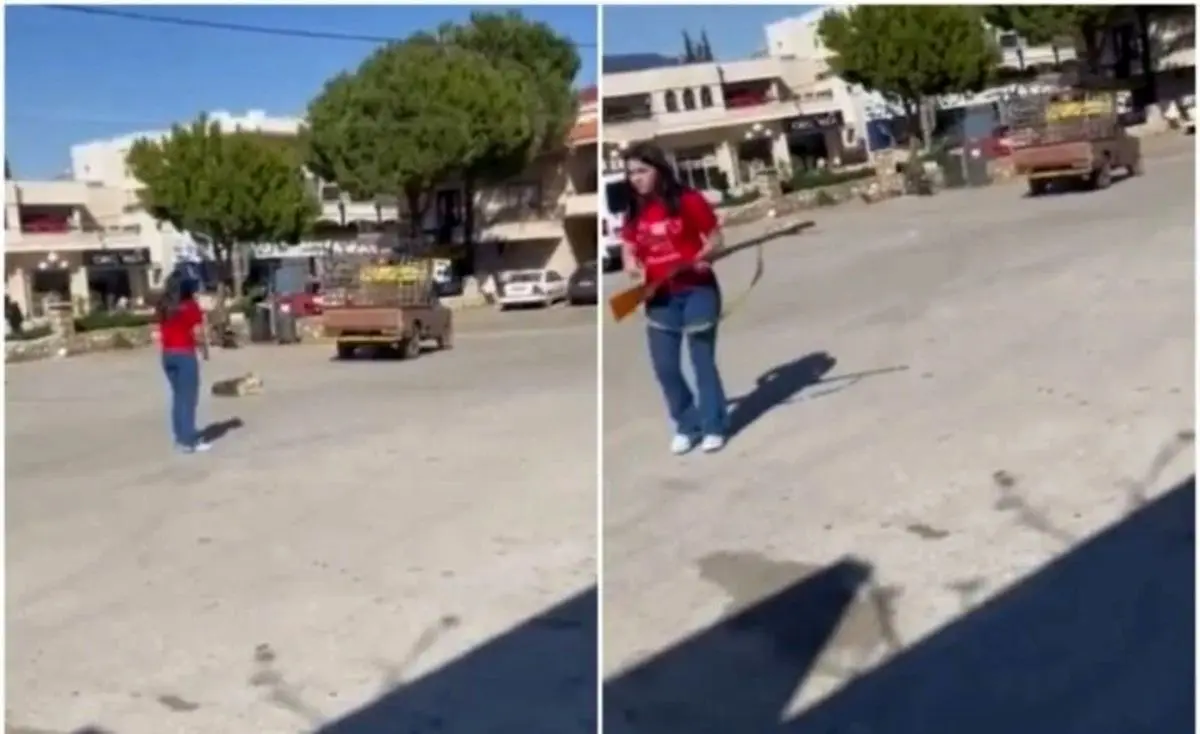 (ویدئو) سگ کشی زن جوان با اسلحه جنجالی شد