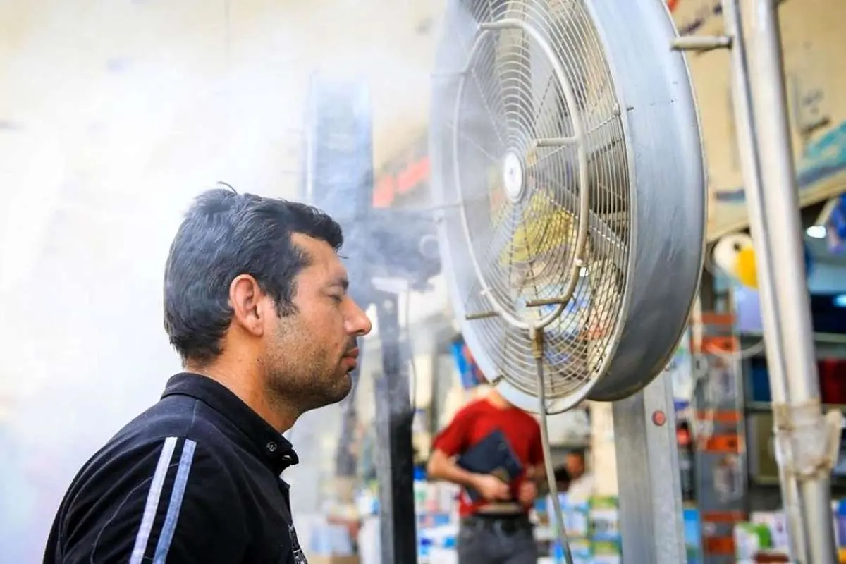 (تصاویر) خنک شدن عراقیها با پنکههای خیابانی