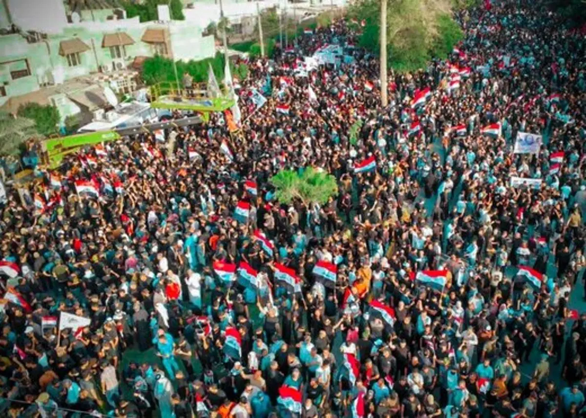 (عکس) ماجرای جعل پرچم ایران در تظاهرات بغداد