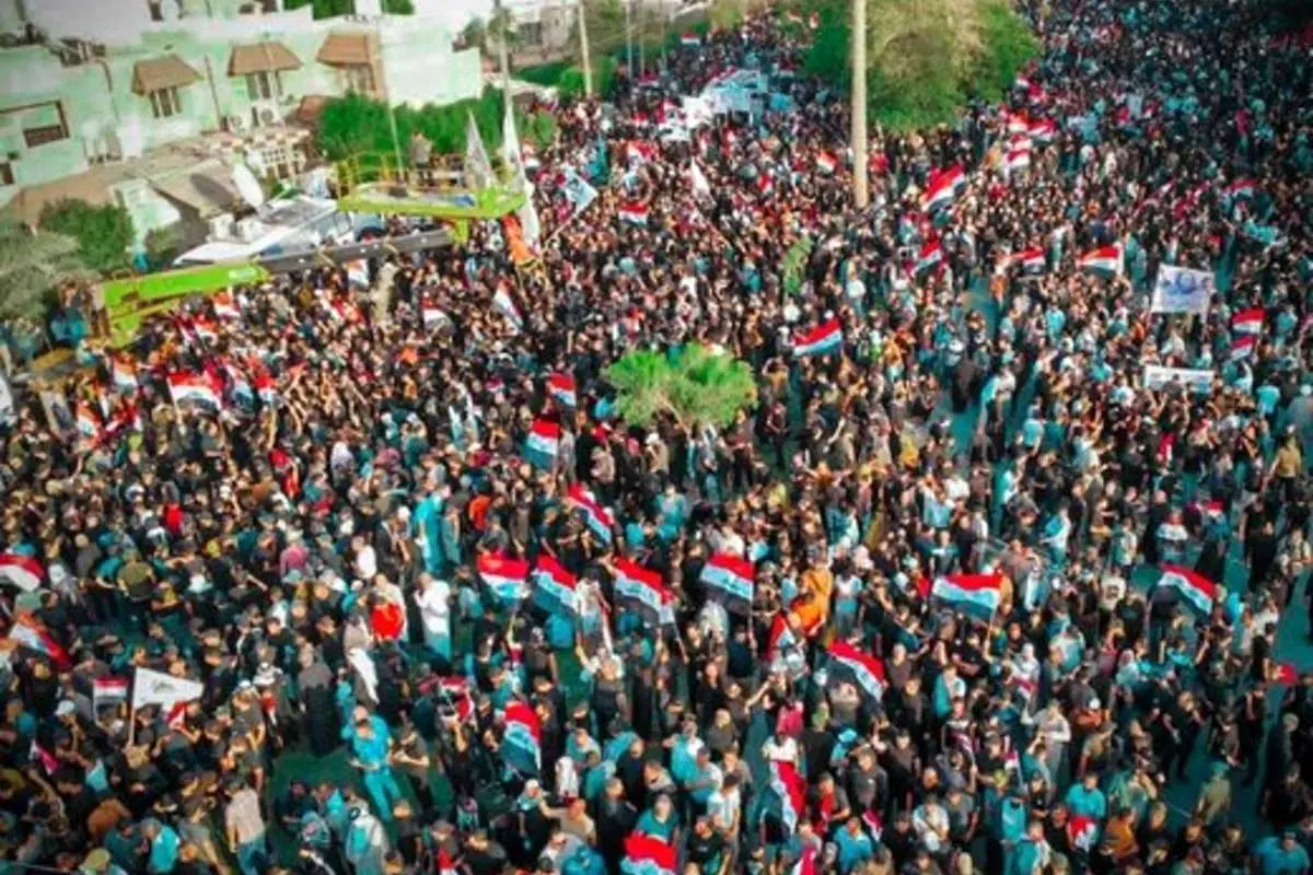 (عکس) ماجرای جعل پرچم ایران در تظاهرات بغداد