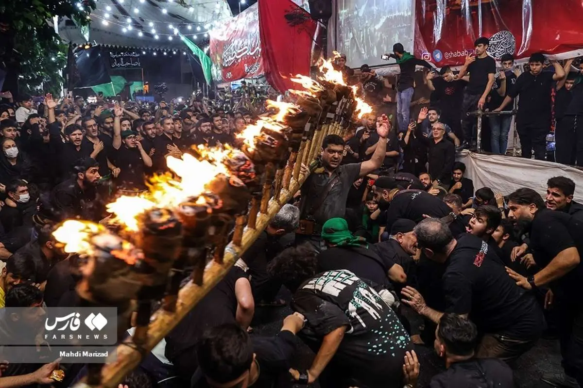 (تصاویر) آئین سنتی مشعل گردانی در تهران