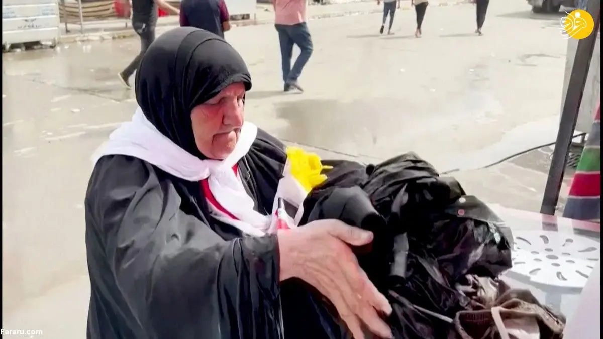 (ویدئو) خدمات رسانی متفاوت پیرزن عراقی به هواداران مقتدی صدر