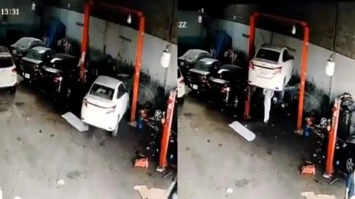 (ویدئو) نجات معجزه آسا از سقوط خودرو در تعمیرگاه