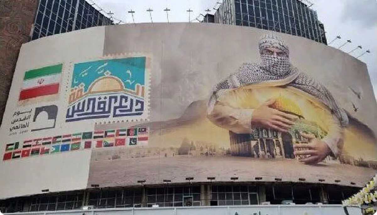 (تصویر) پرچم طالبان روی دیوارنگاره میدان ولیعصر/ سازمان اوج: اشتباه شده بود و اصلاحش کردیم