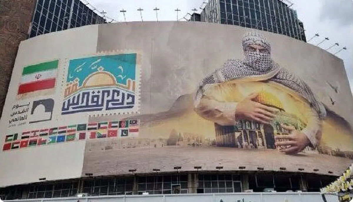 (تصویر) پرچم طالبان روی دیوارنگاره میدان ولیعصر/ سازمان اوج: اشتباه شده بود و اصلاحش کردیم