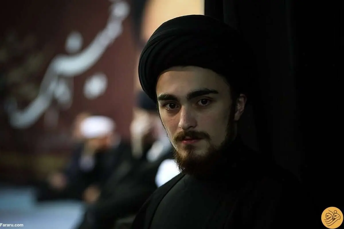 (عکس) پوشش متفاوت و خاص احمد خمینی در ورزشگاه آزادی