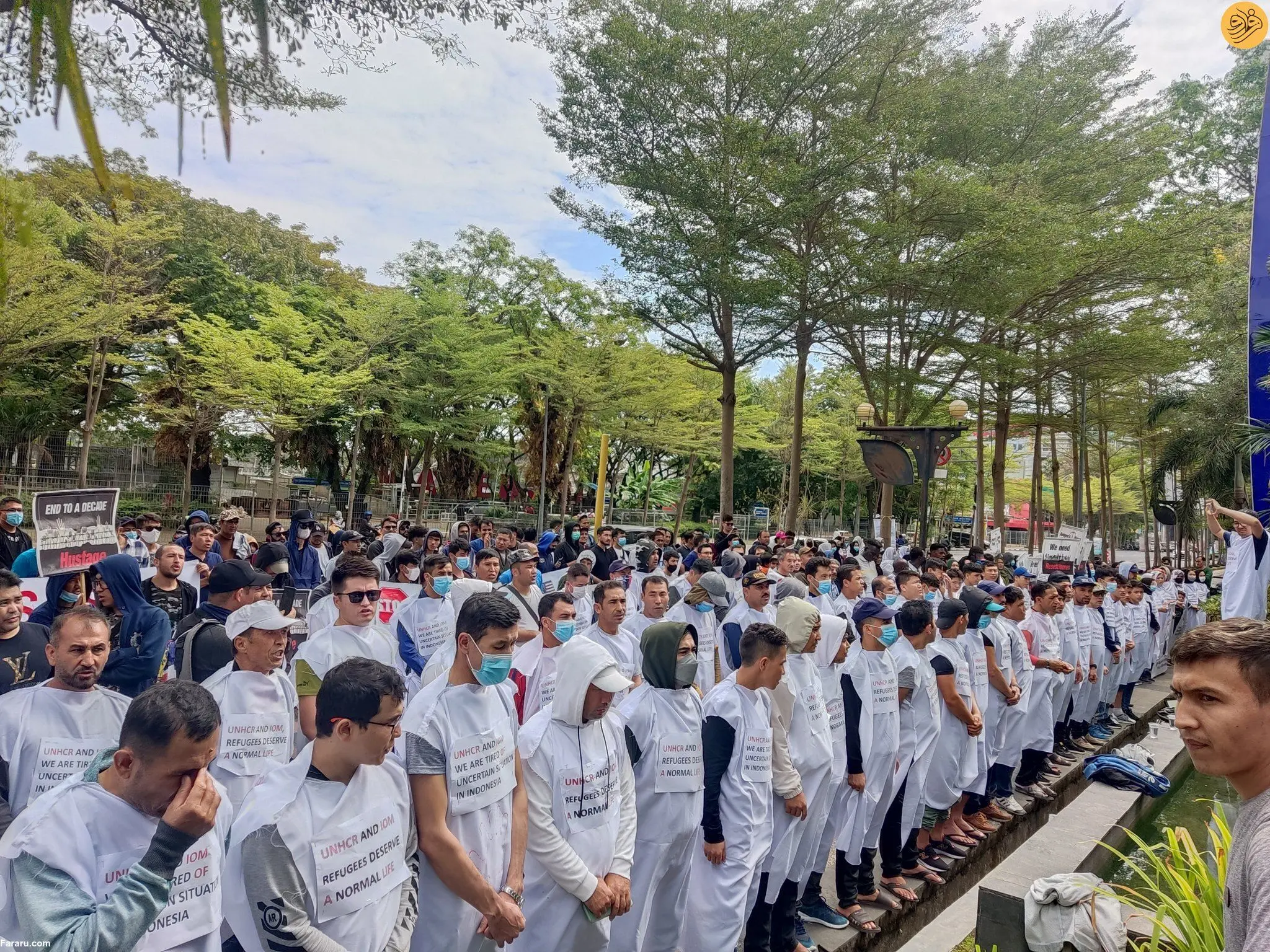 (عکس) پناهندگان افغان در اندونزی کفن پوشیدند
