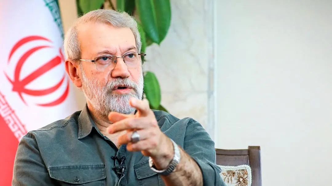 تصویری از تابوت لاریجانی در کنار فرزندش