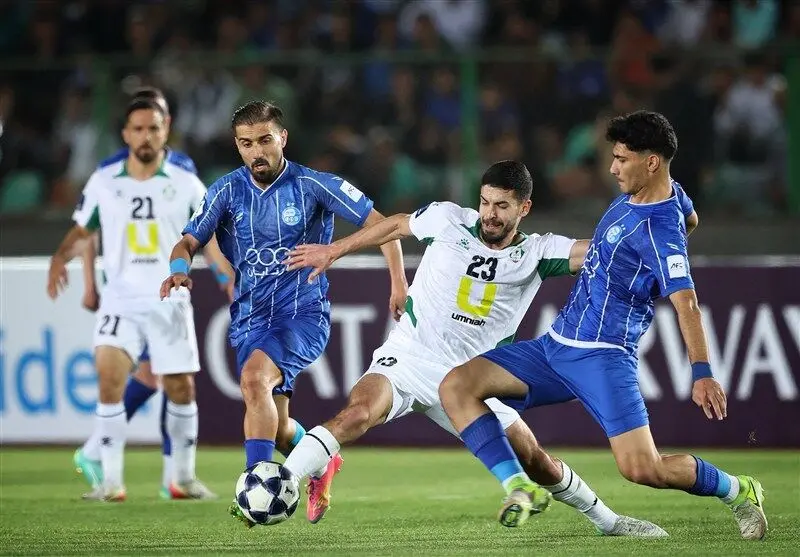 شعار هواداران علیه پرسپولیس در بازی استقلال مقابل الوحدات
