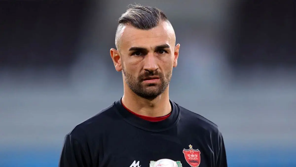 (عکس) رفیق معروف مهاجم پرسپولیس؛ سردار دورسون در کنار بازیکن رئال مادرید