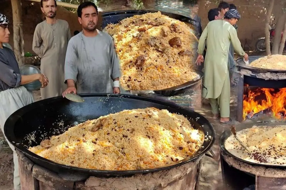 (ویدئو) فرایند پخت ۲۰۰ کیلوگرم قابلی پلو برای یک مراسم عروسی در افغانستان