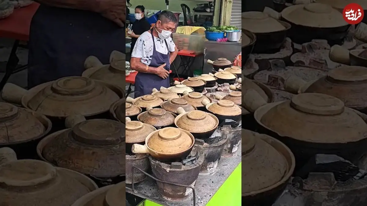 (ویدئو) غذای خیابانی؛ پخت پلو مرغ سفالی مشهور در خیابان‌های کوالالامپور