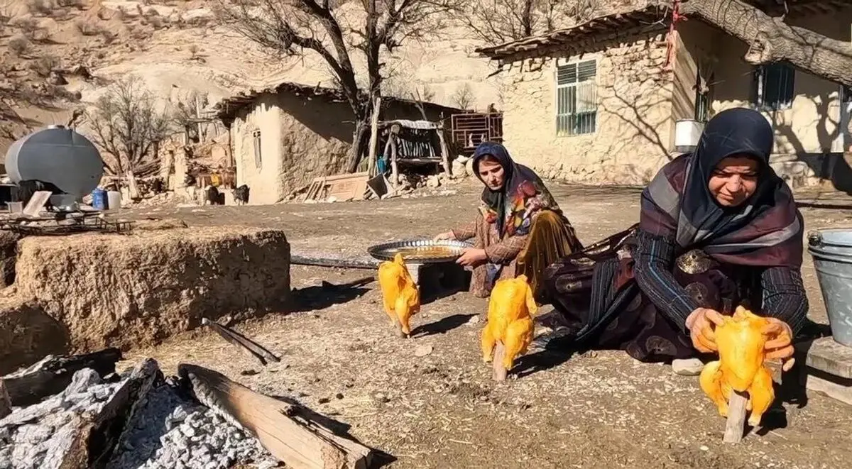 (ویدئو) کباب کردن تماشایی مرغ زیر سطل‌های فلزی توسط کدبانوی بختیاری
