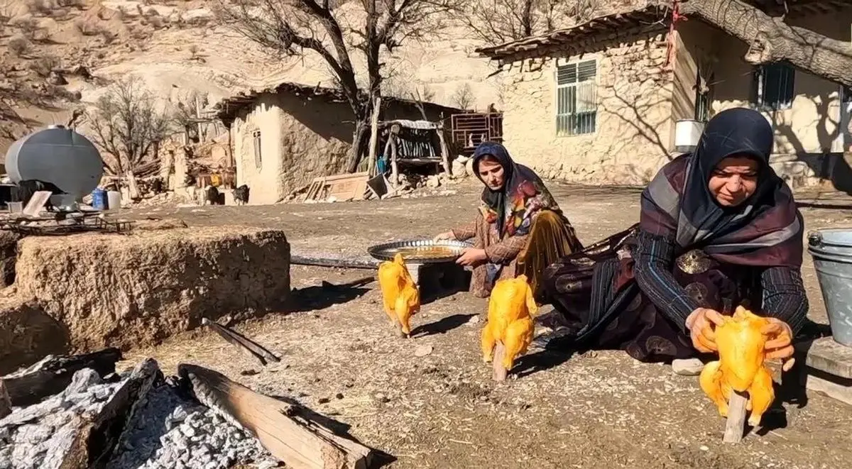 (ویدئو) کباب کردن تماشایی مرغ زیر سطل‌های فلزی توسط کدبانوی بختیاری