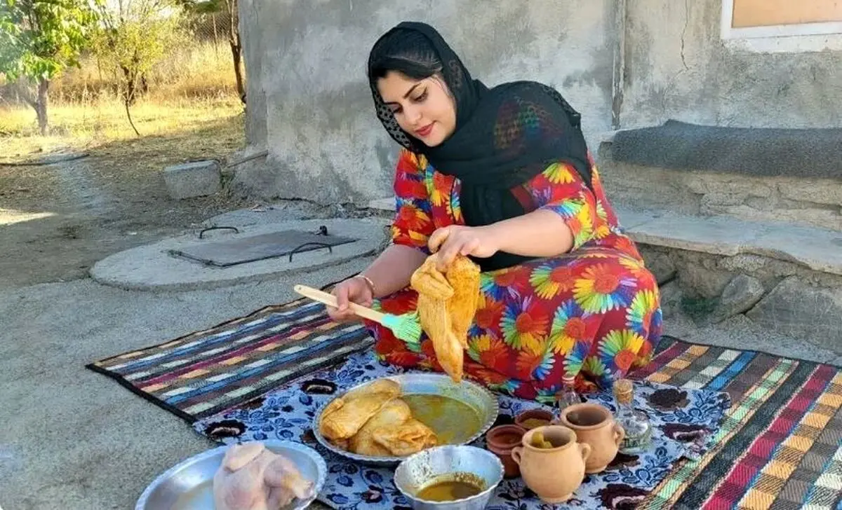 (ویدئو) روش شگفت انگیز دختر کردستانی برای پختن مرغ روی سنگ