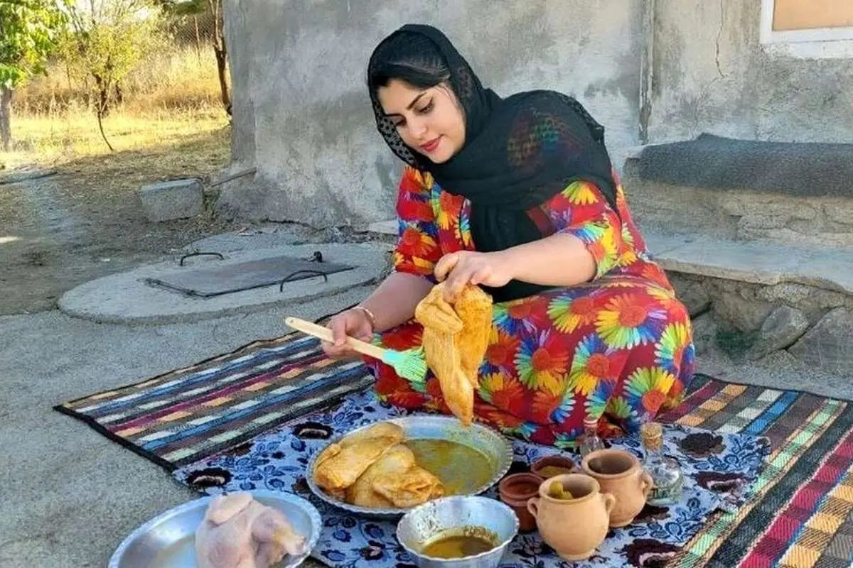 (ویدئو) روش شگفت انگیز دختر کردستانی برای پختن مرغ روی سنگ