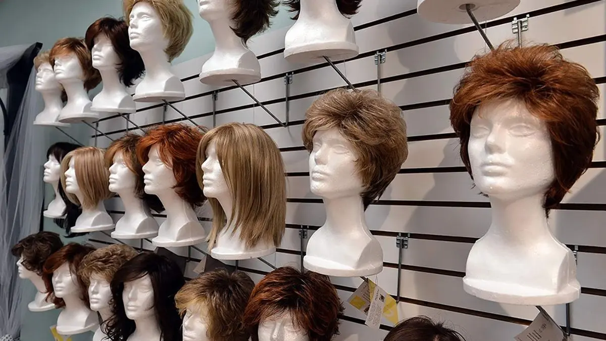 (عکس) زن نیجریه‌ای کلاه‌گیس ۳۵۰ متری را در ۱۱ روز ساخت!