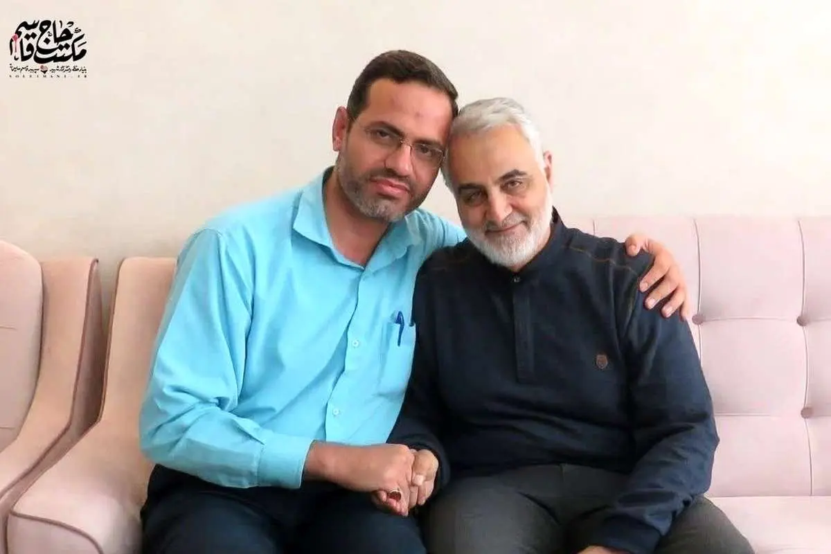تصویری از شهید آقازاده در کنار حاج قاسم