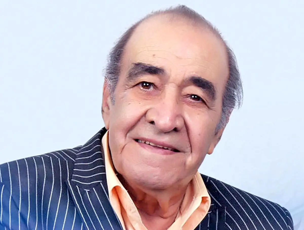 (ویدئو) اجرای دلنشین من یه پرنده‌م توسط ایرج خواجه امیری و یک نوازنده خیابانی