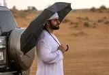 تصاویر؛ بارش باران تابستانی و حال خوب اماراتی‌ها 