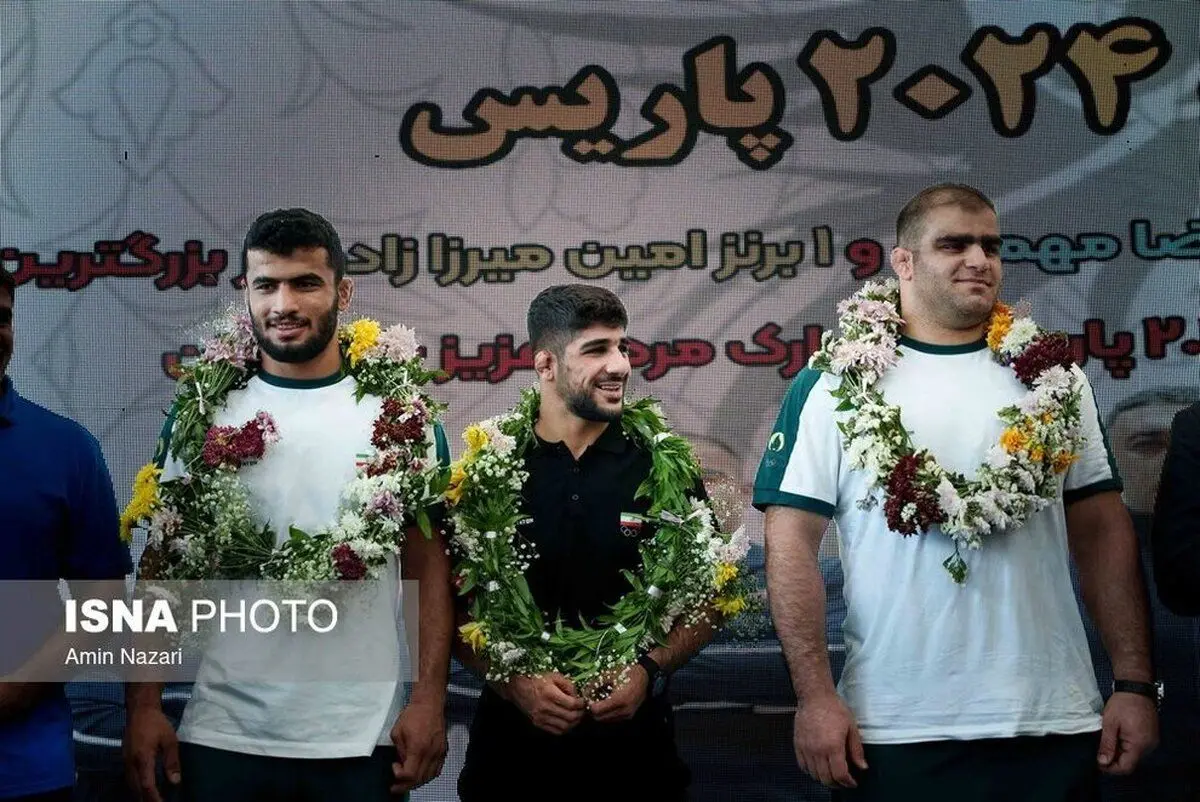 (تصاویر) استقبال از کشتی گیران المپیکی خوزستان در اهواز