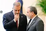 تصویر؛ صحبت در گوشی هاکان فیدان و عراقچی