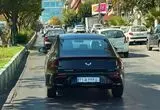 وولینگ استارلایت با پلاک ملی در تهران؛ سدان پلاگین‌هیبرید چینی با استایل فست‌بک