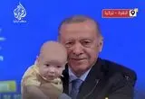 اردوغان با نوزادی عکس یادگاری گرفت