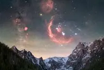 عکس روز ناسا از آسمان شب شکارچی در کوه‌های یخ‌زده