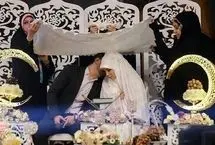 وام ازدواج غیرنقدی؛ کارت اعتباری روی میز عروس و داماد