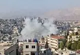 ببینید؛ فرار مجری شبکه تلویزیون سوریه هنگام حمله اسرائیل