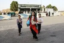 تصاویر؛ توزیع غذای متبرک امام رضا(ع) میان مهاجران افغان در مرز
