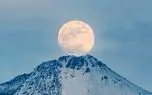 تصاویری از برآمدن قرص کامل ماه بر فراز قله سبلان