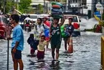  نجات گاو و مشاهده مار پیتون در سیل ویرانگر فیلیپین