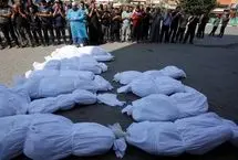 دفن پیکرهای ۵۴ شهید گمنام در غزه