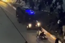 روایت فارس از زیر گرفتن معترضان توسط خودروی زرهی در اردبیل